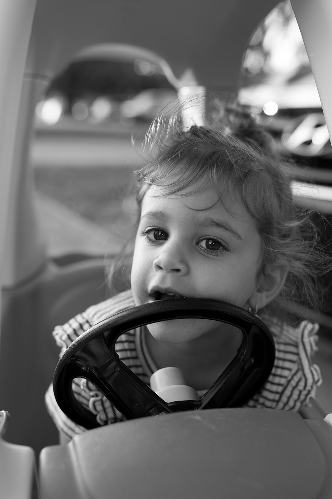 Young girl plays outside of her home in Aventura, Florida.